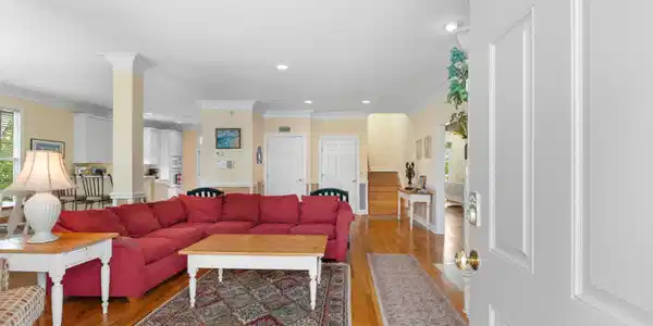 Image 3: Living area featuring crown molding, light wood fi Image 3: Living area featuring crown molding, light wood fi