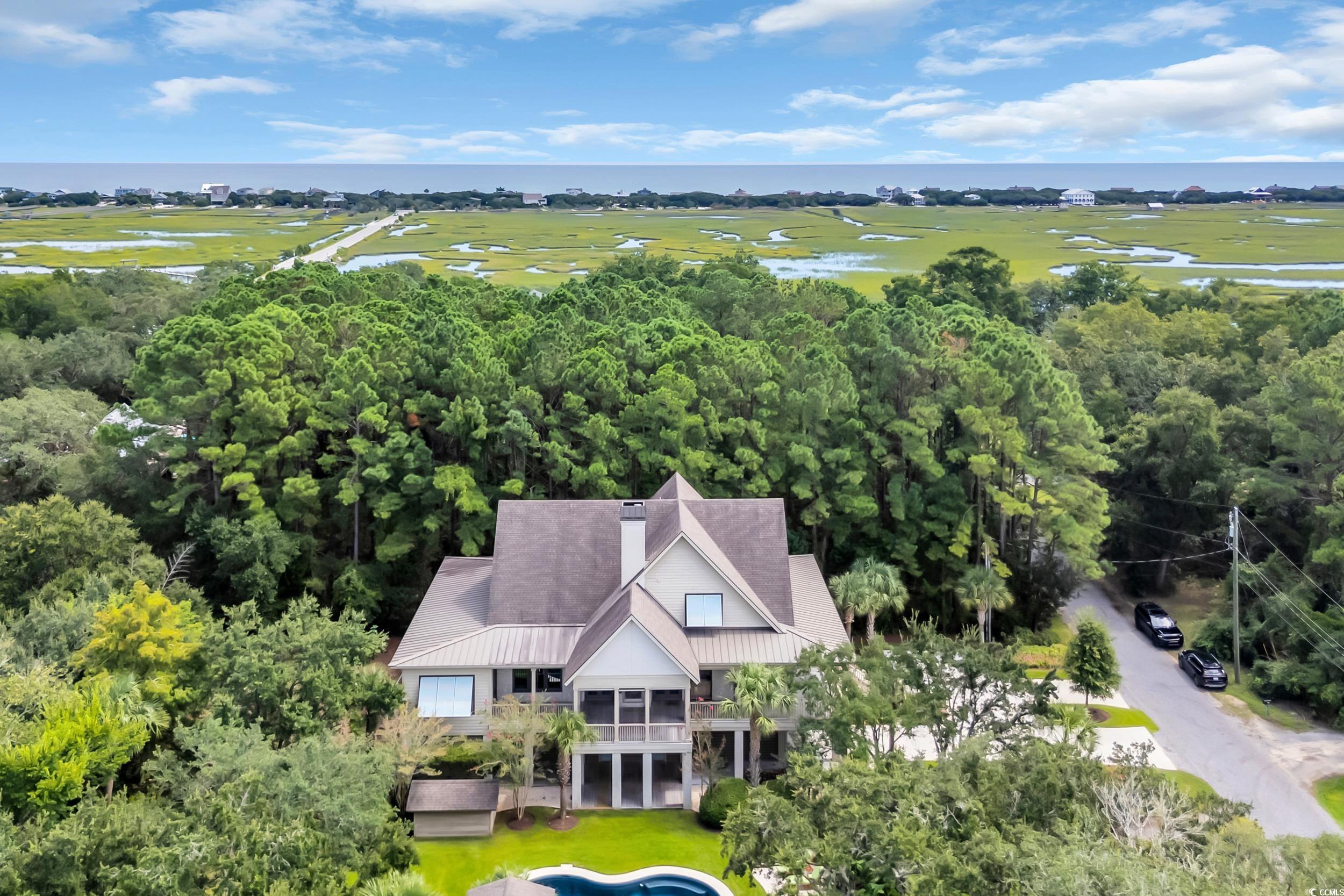 Image 4: Drone / aerial view of a nearby body of water and Image 4: Drone / aerial view of a nearby body of water and