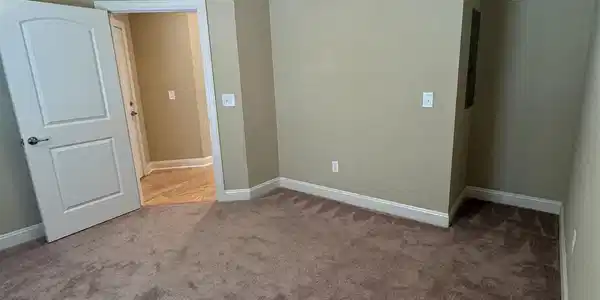 Image 4: Unfurnished bedroom with carpet and a ceiling fan