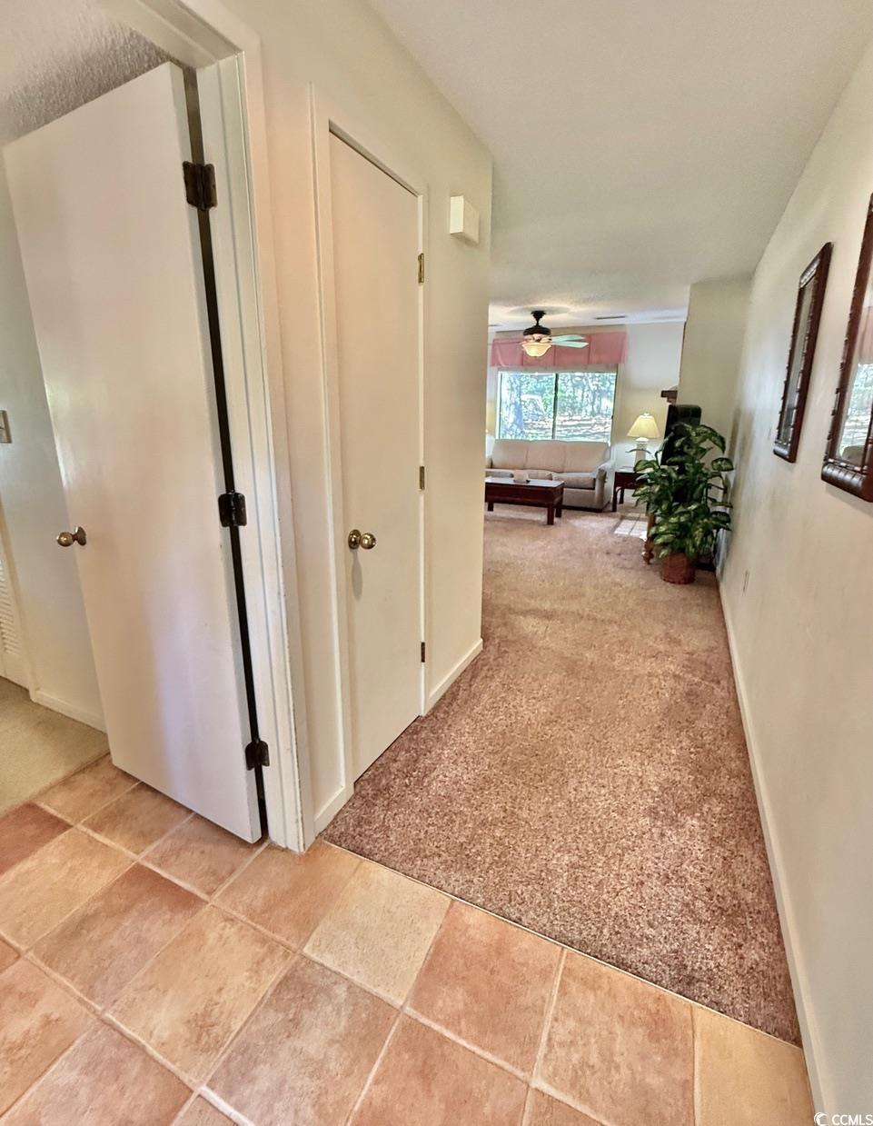 Image 2: Hall featuring light carpet and light tile pattern Image 2: Hall featuring light carpet and light tile pattern
