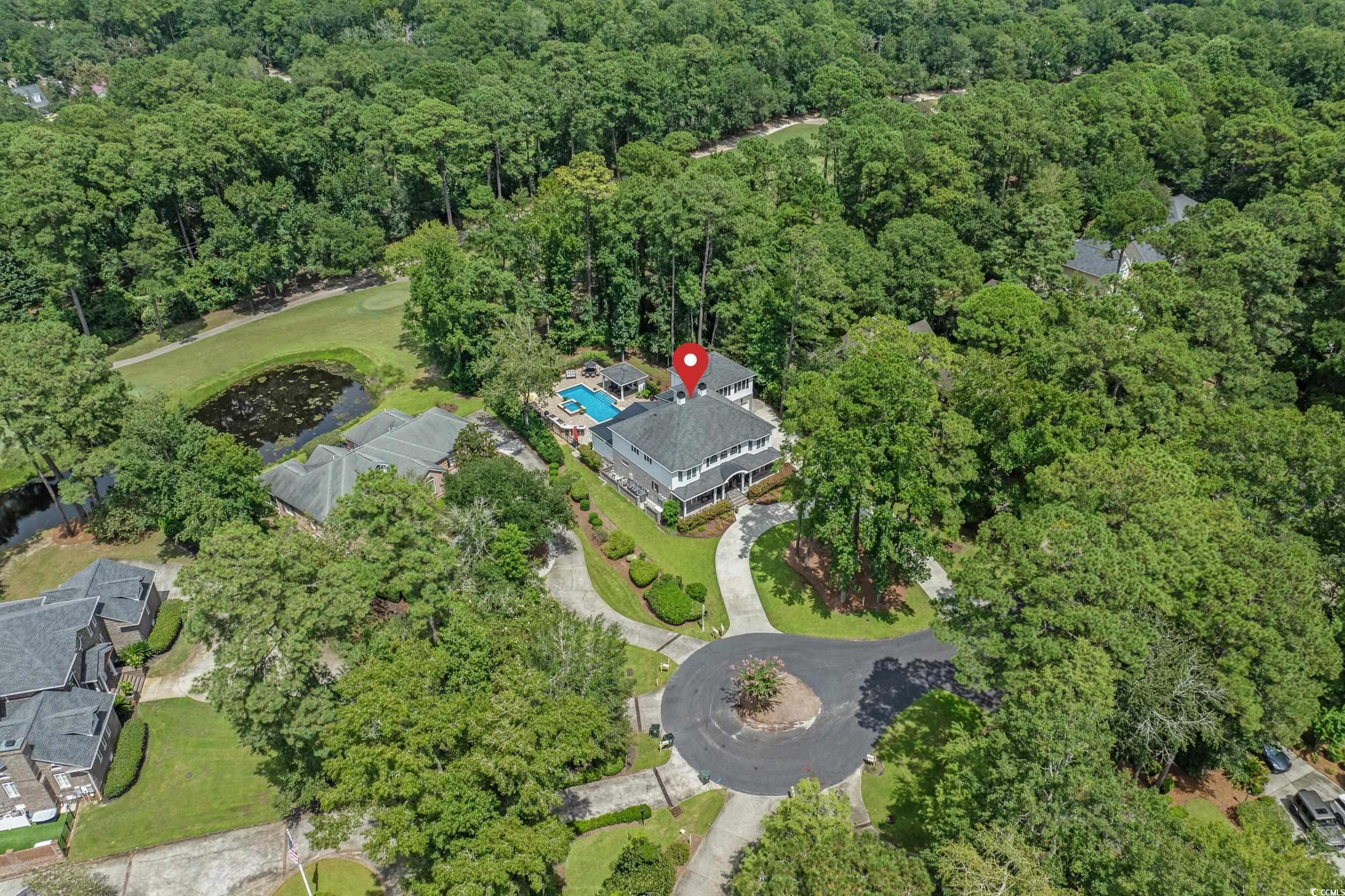 Image 3: Aerial view of property's location with a heavily