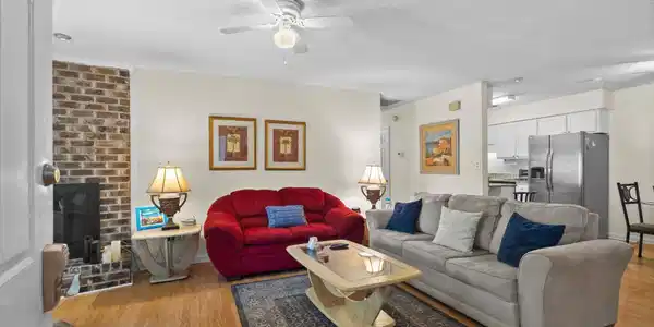 Image 3: Living area featuring light wood finished floors,