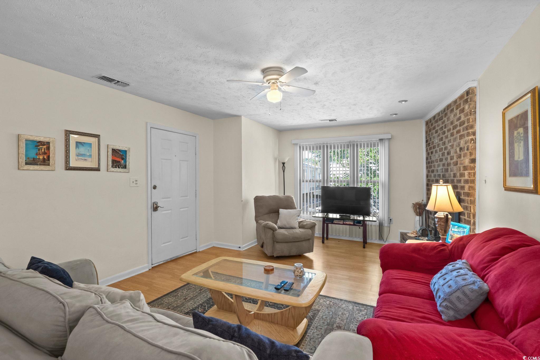 Image 4: Living room featuring wood finished floors, ceilin Image 4: Living room featuring wood finished floors, ceilin