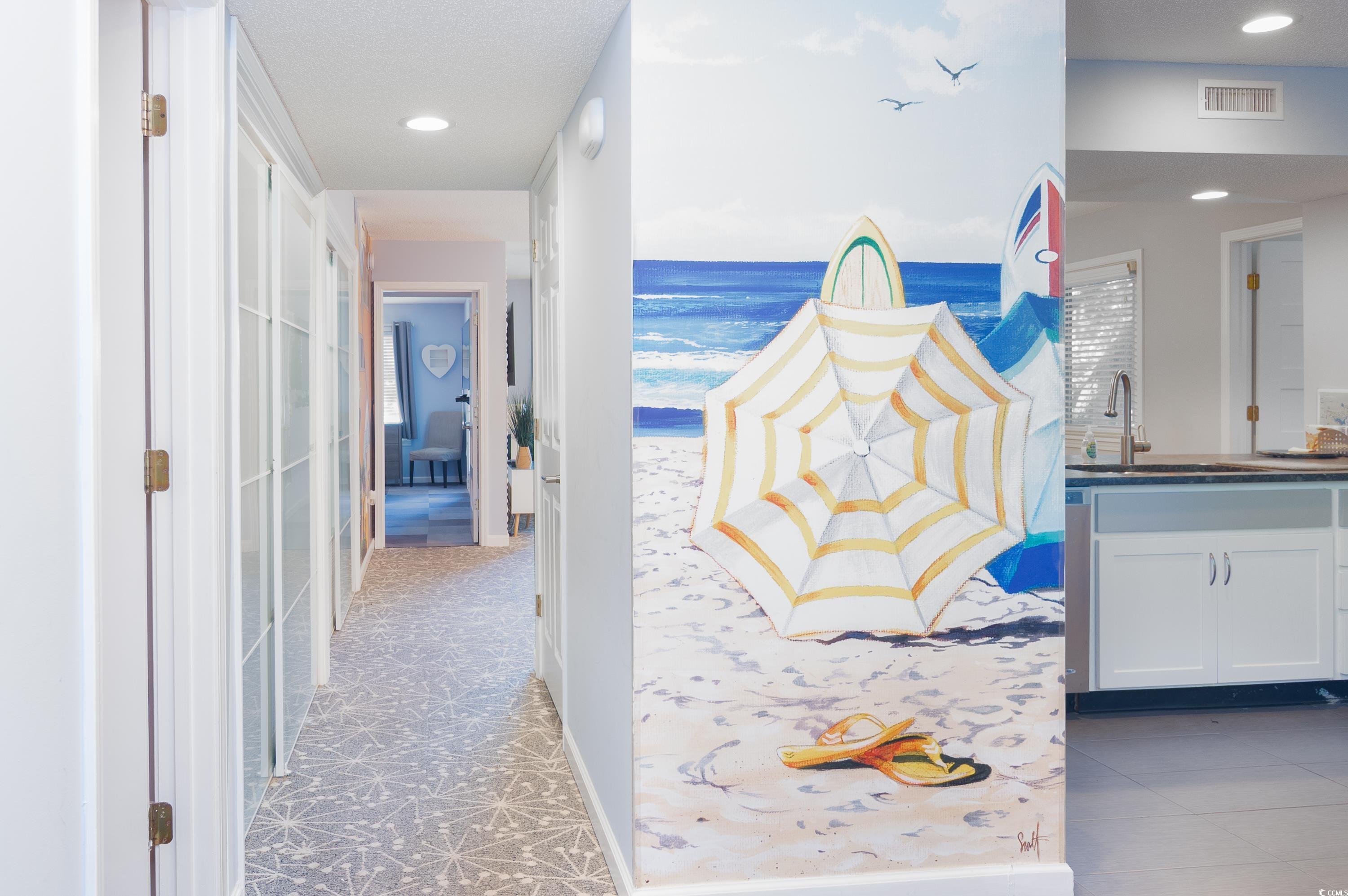 Image 2: Hall with recessed lighting and light tile pattern Image 2: Hall with recessed lighting and light tile pattern