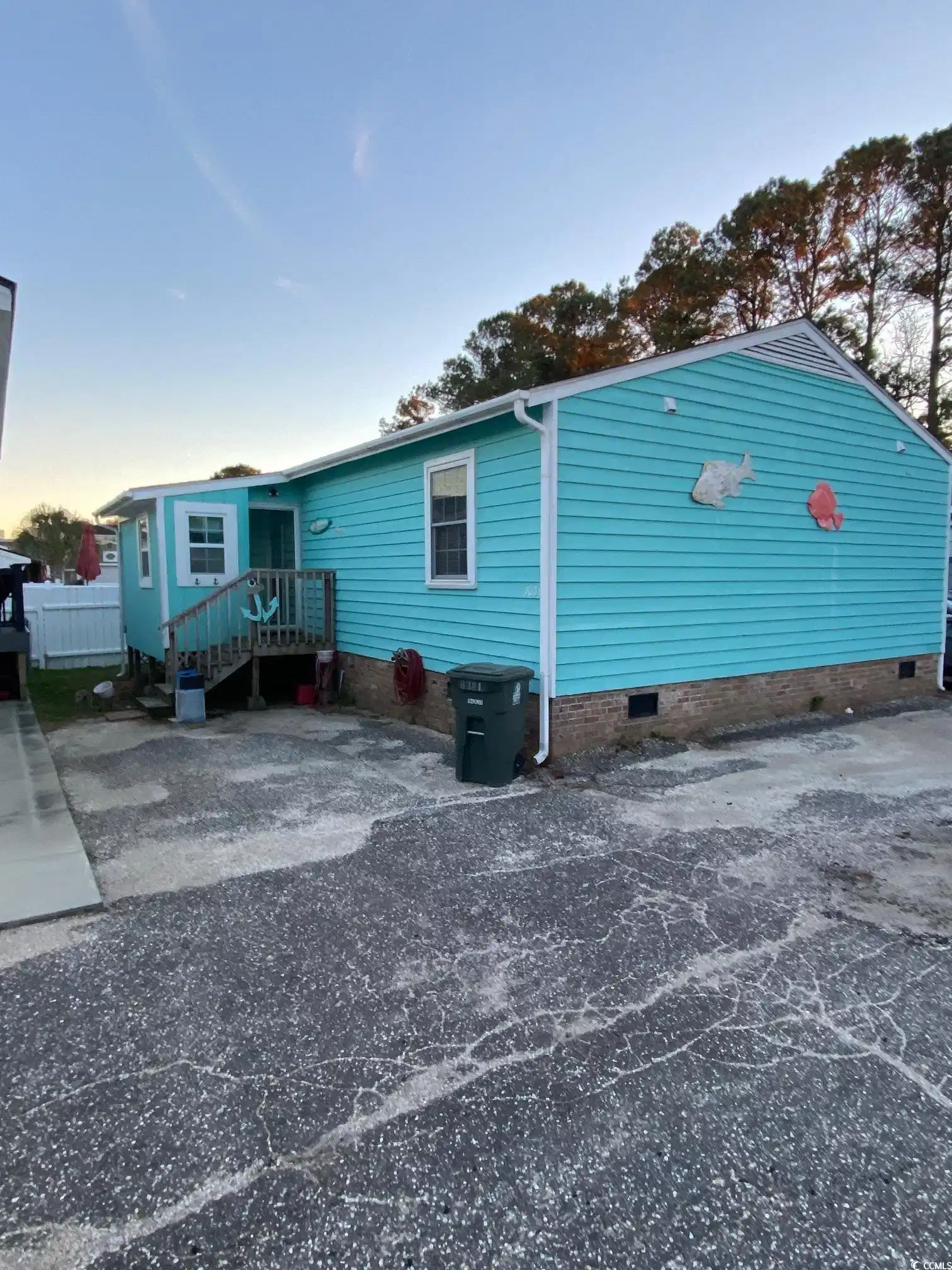 Image 1: View of front of house with crawl space Image 1: View of front of house with crawl space