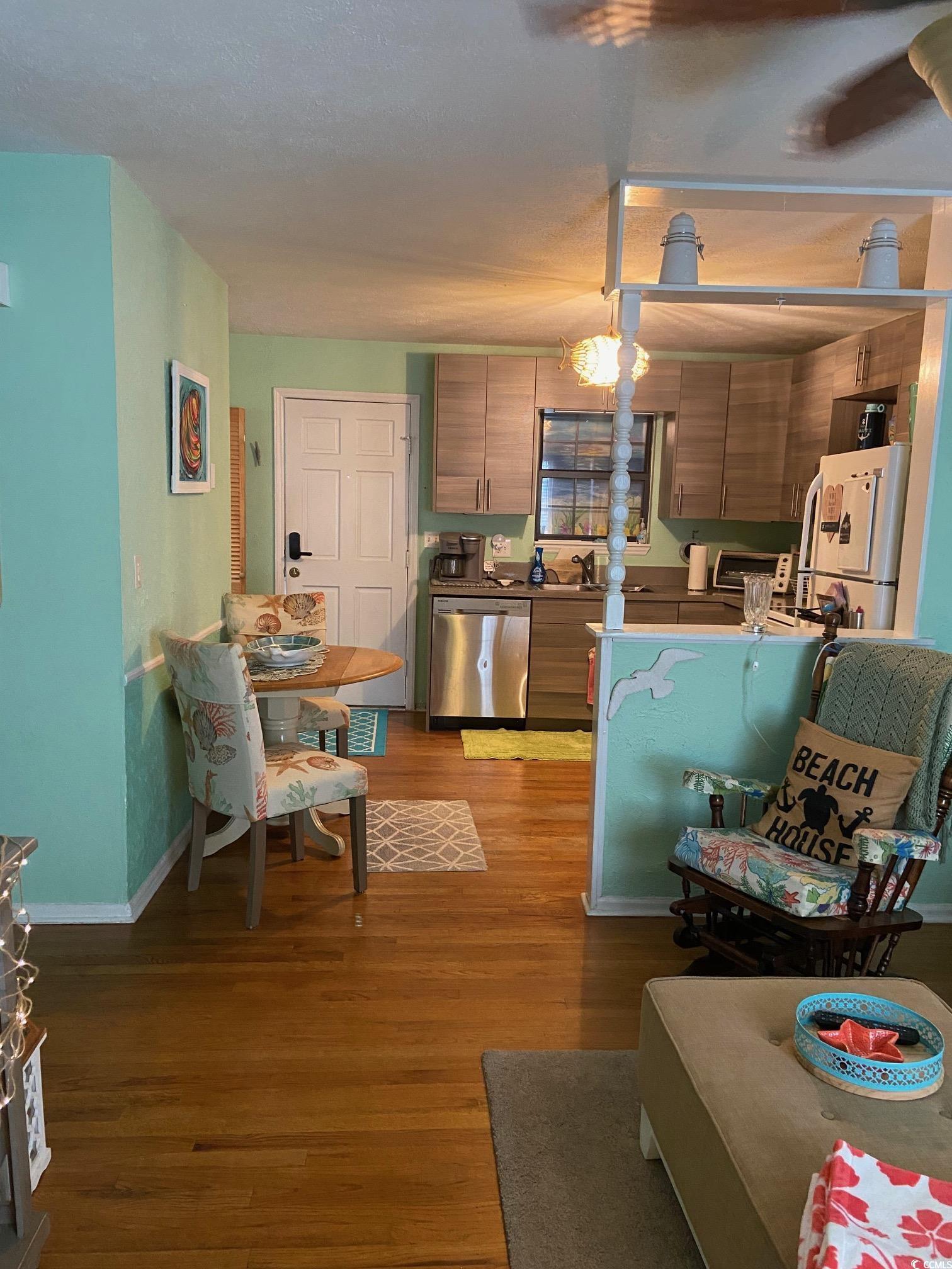 Image 2: Kitchen featuring stainless steel dishwasher, free