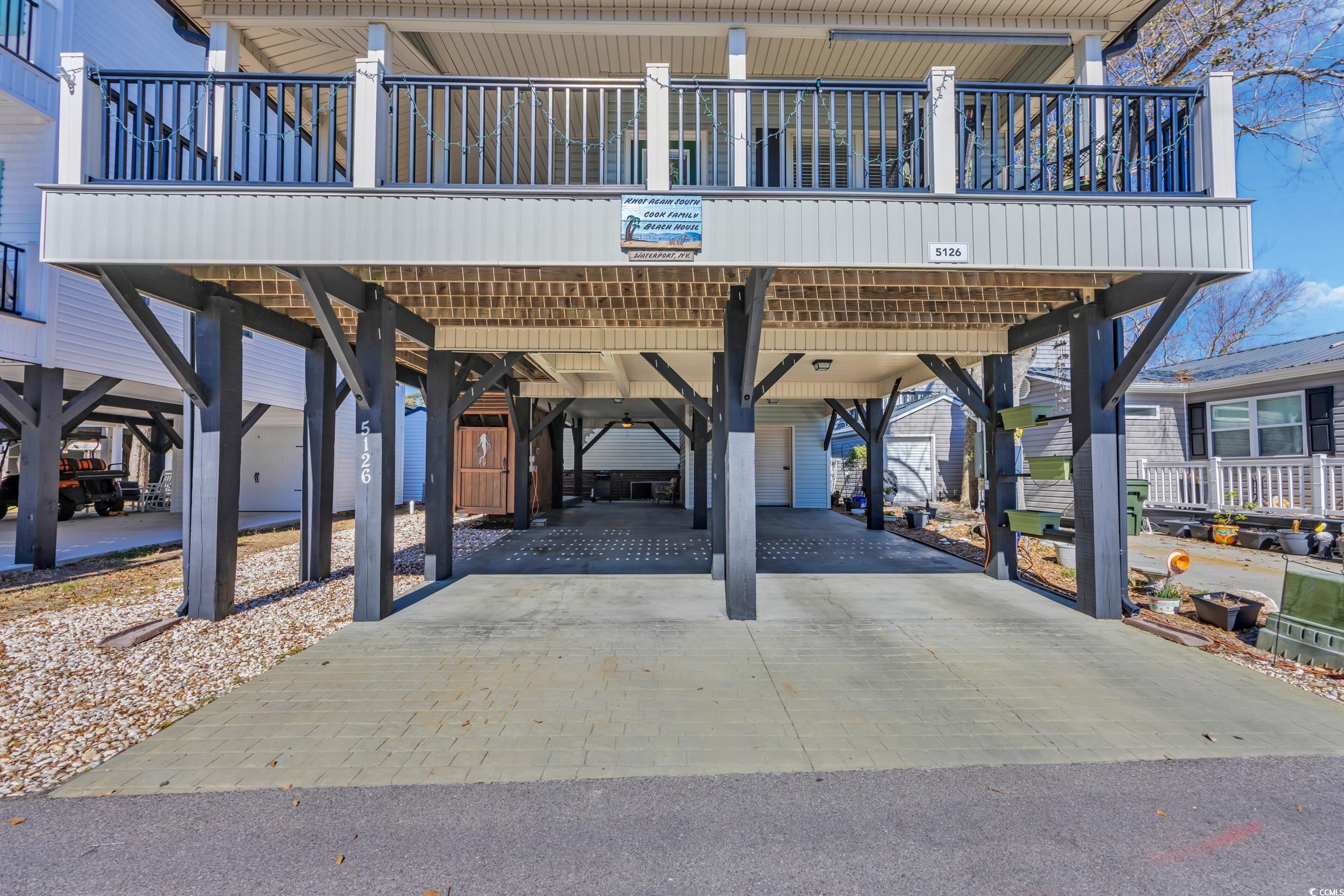 Image 4: Exterior space with a carport Image 4: Exterior space with a carport