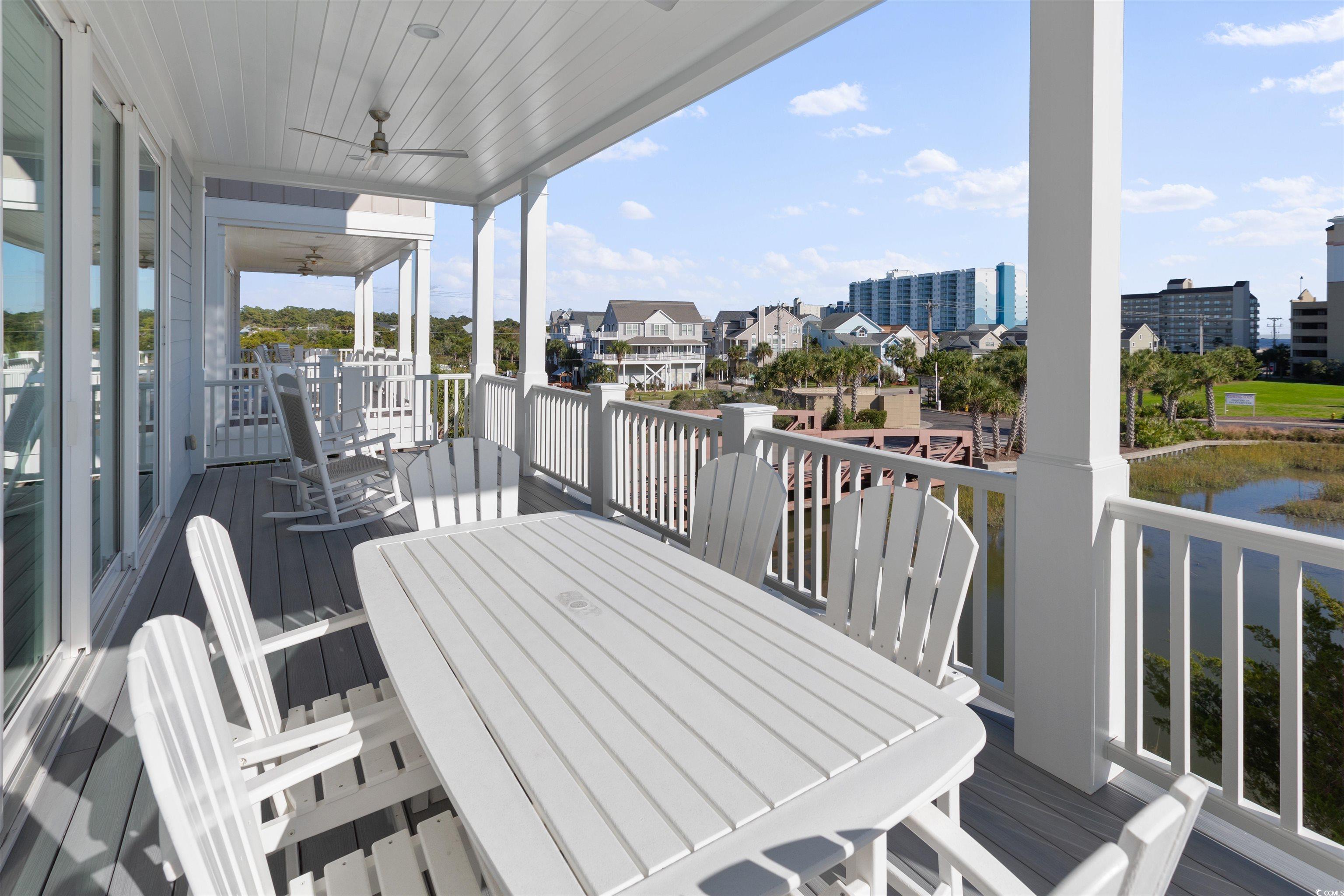 Image 4: Wooden terrace featuring ceiling fan