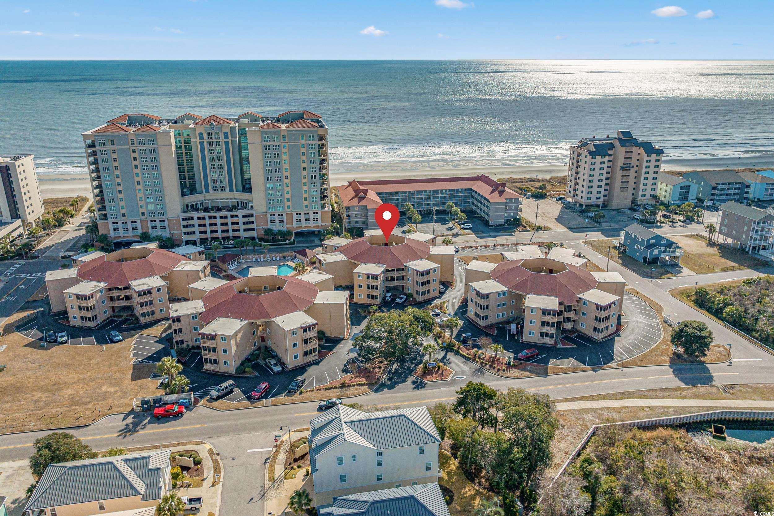 Image 2: Drone / aerial view with a water view and a beach Image 2: Drone / aerial view with a water view and a beach
