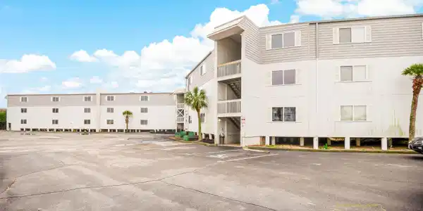 Image 4: View of apartment building / complex featuring unc Image 4: View of apartment building / complex featuring unc