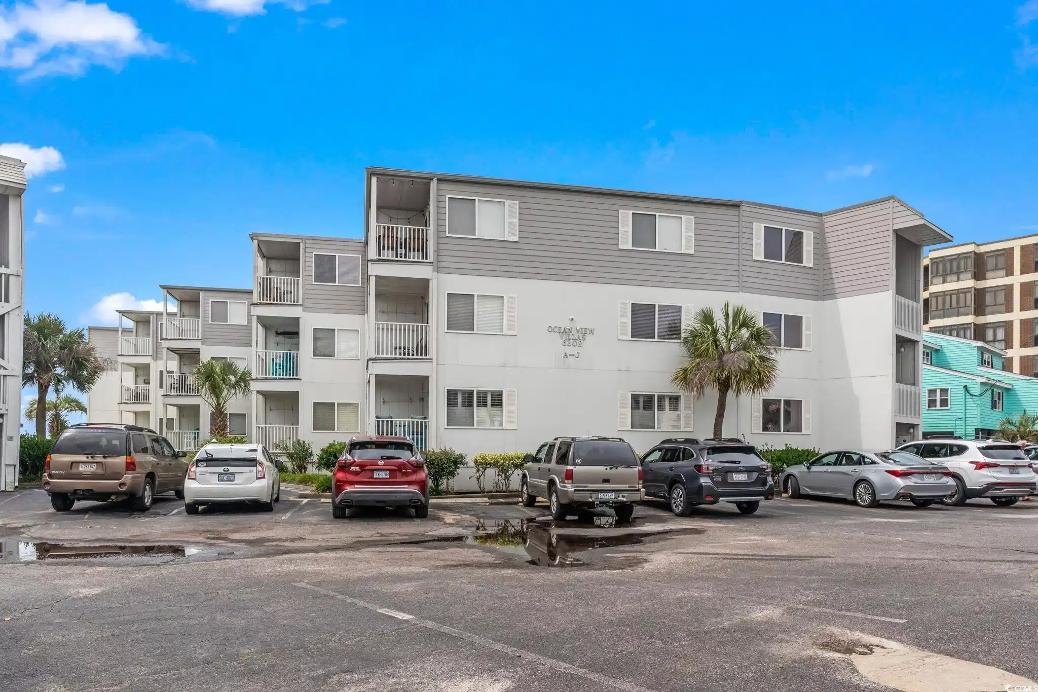 Image 1: View of apartment building / complex featuring unc Image 1: View of apartment building / complex featuring unc