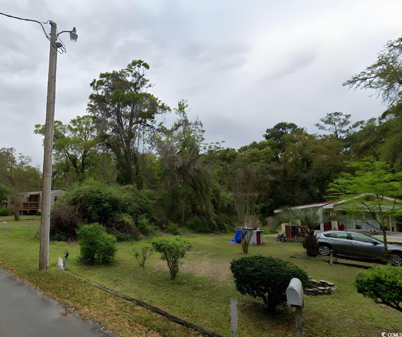 Image 3: View of property's community featuring a yard Image 3: View of property's community featuring a yard