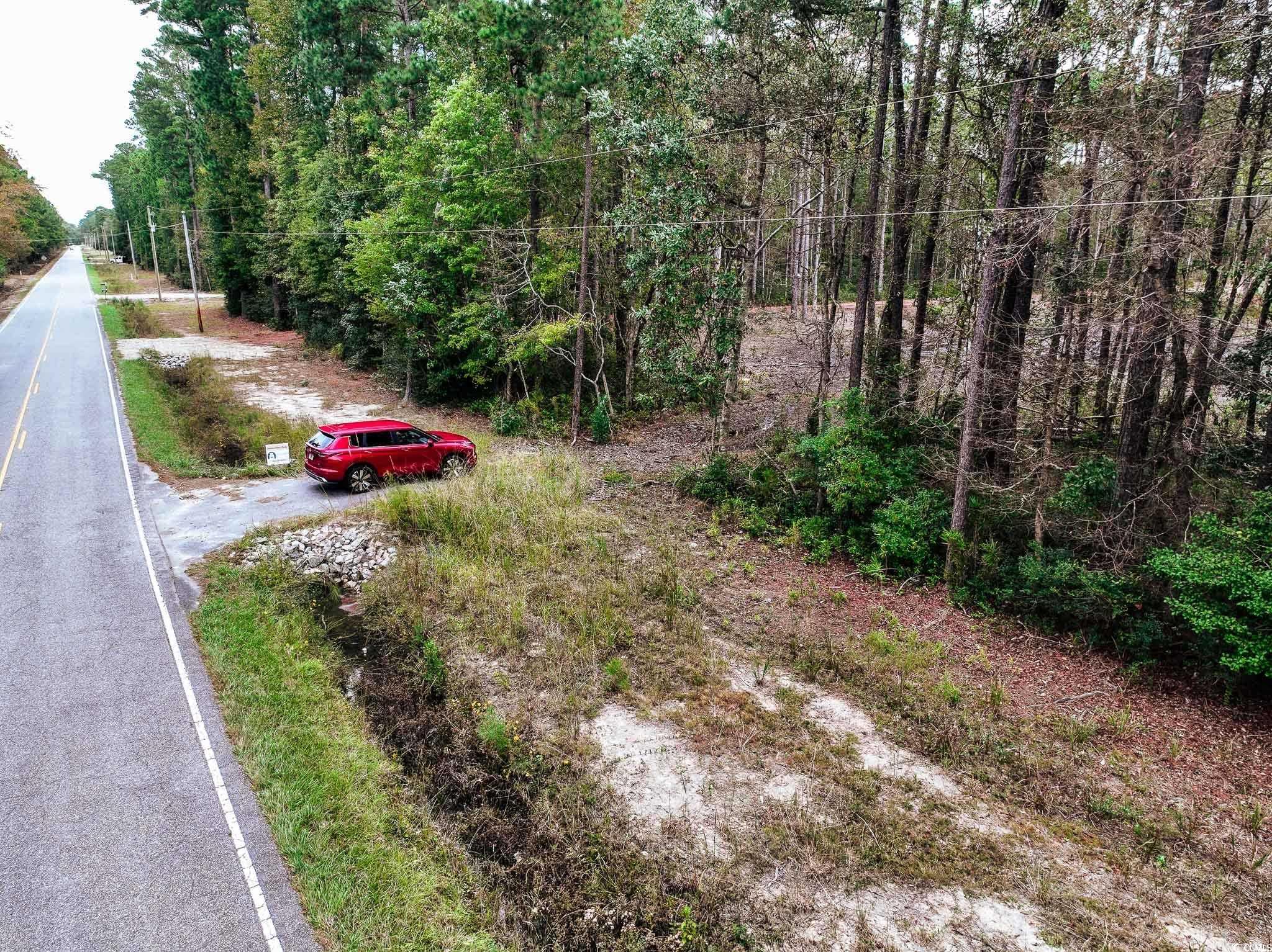 Image 2: Street view of site looking West