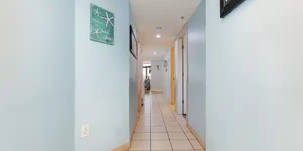 Image 3: Hallway with light tile patterned floors Image 3: Hallway with light tile patterned floors