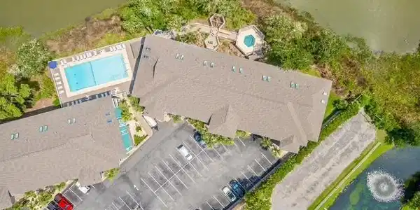 Image 4: Drone / aerial view of a pool area Image 4: Drone / aerial view of a pool area