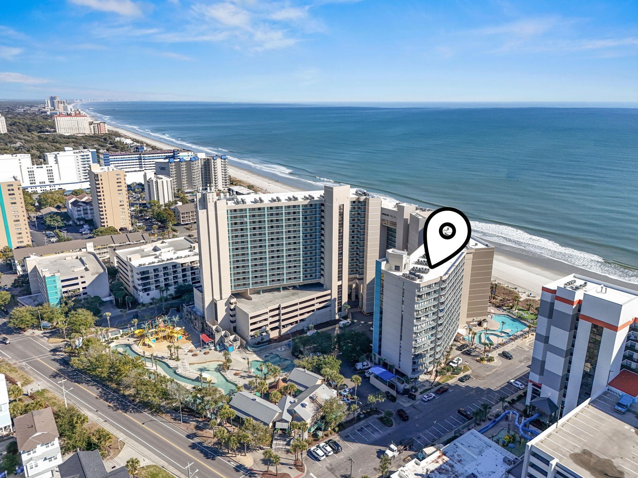 Image 2: View of urban area with unending shoreline