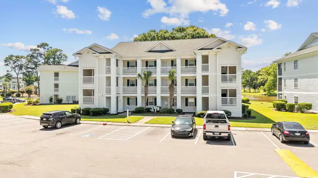 Image 1: View of property with uncovered parking