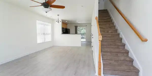 Image 4: Stairway featuring wood finished floors, ceiling f Image 4: Stairway featuring wood finished floors, ceiling f