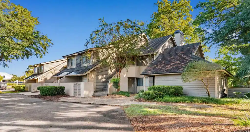 Image 1: Mid-century inspired home featuring a chimney Image 1: Mid-century inspired home featuring a chimney