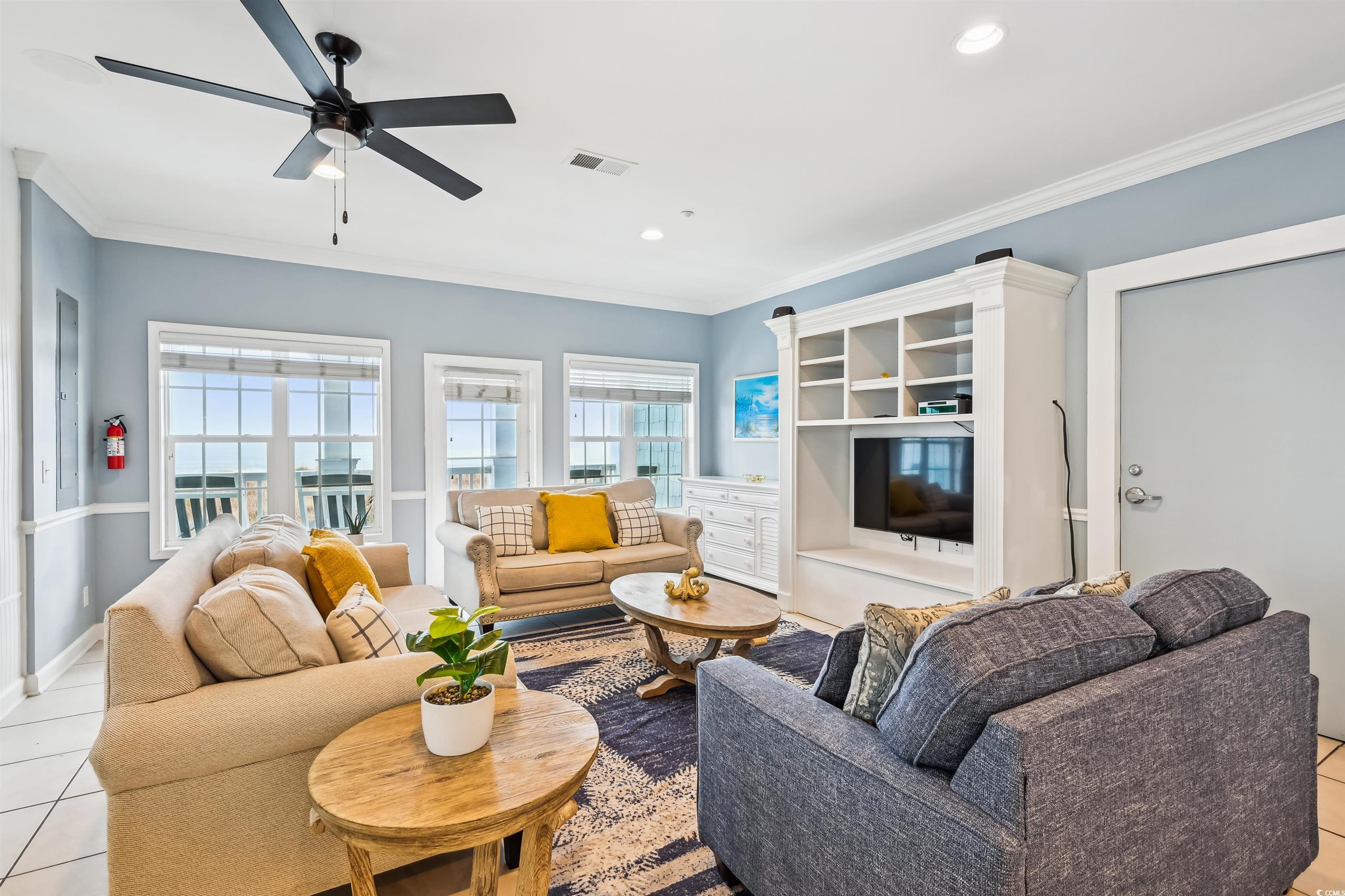 Image 4: Living room featuring light tile patterned floorin Image 4: Living room featuring light tile patterned floorin