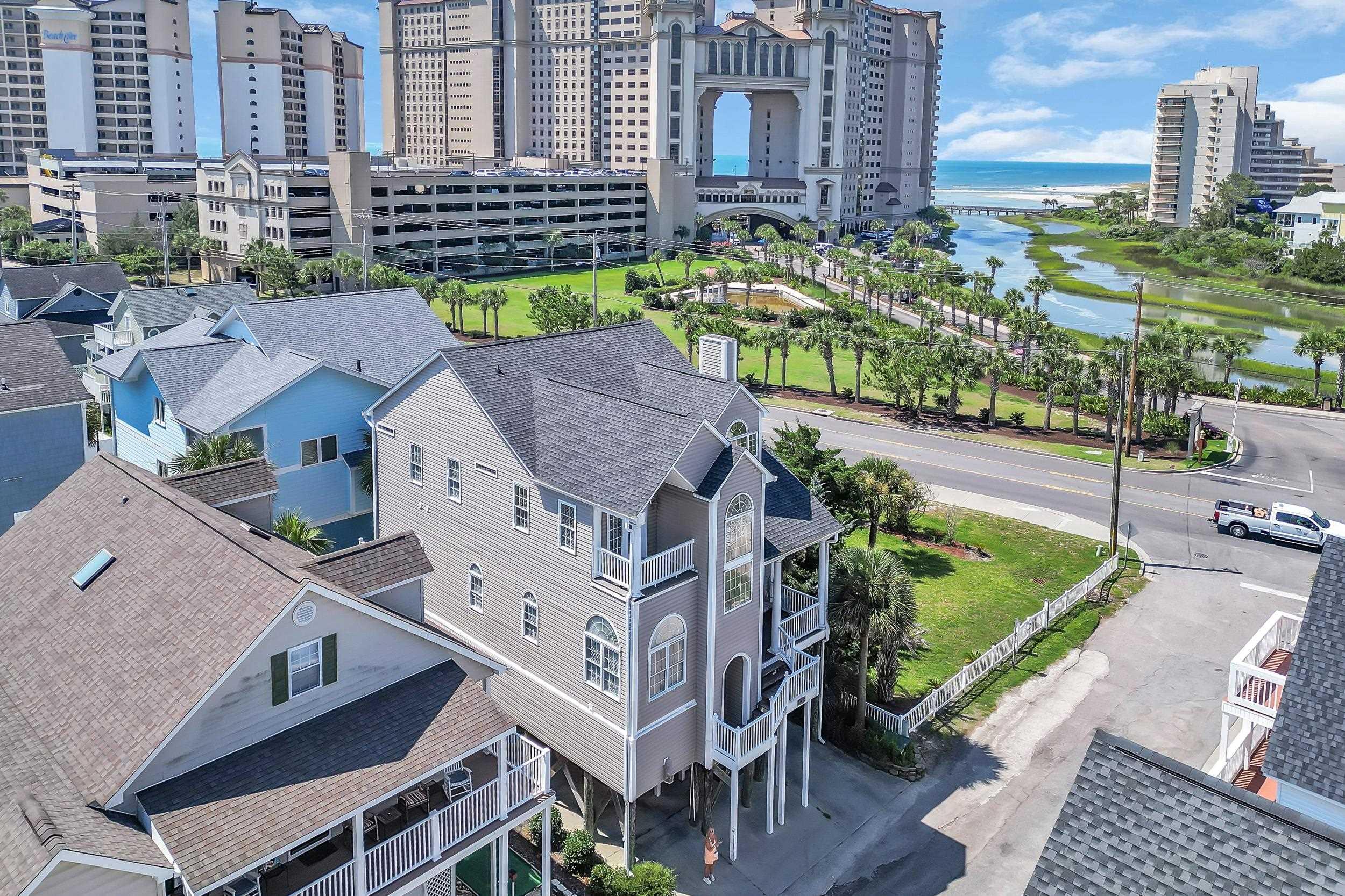 Image 2: View of urban area featuring apartment complex and