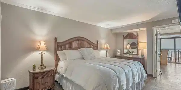 Image 2: Bedroom featuring ornamental molding, wood finishe