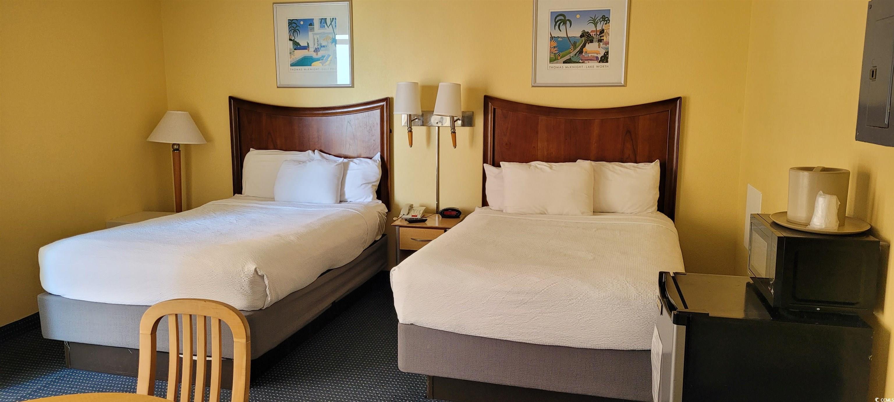 Image 2: Bedroom with carpet floors