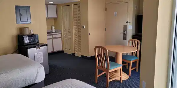 Image 4: Bedroom featuring a closet and dark colored carpet