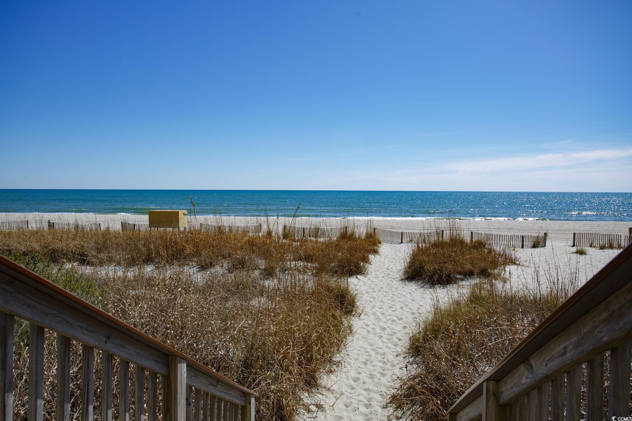Image 2: Water view with local beach Image 2: Water view with local beach