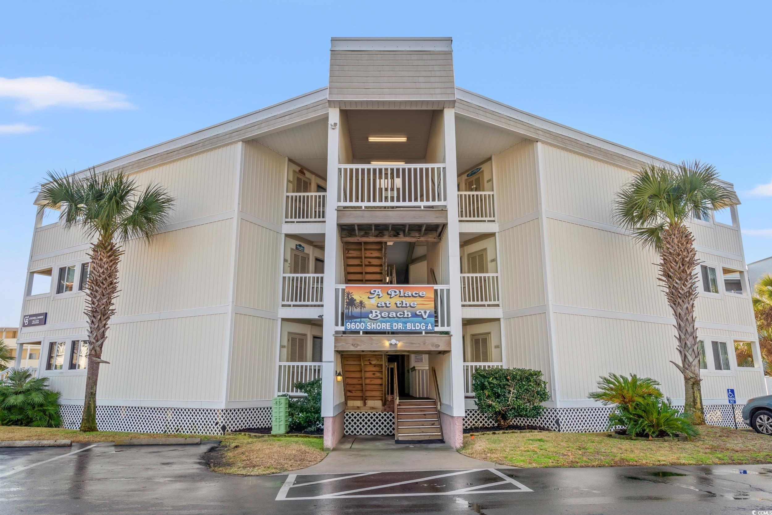 Image 1: View of apartment building / complex featuring unc Image 1: View of apartment building / complex featuring unc