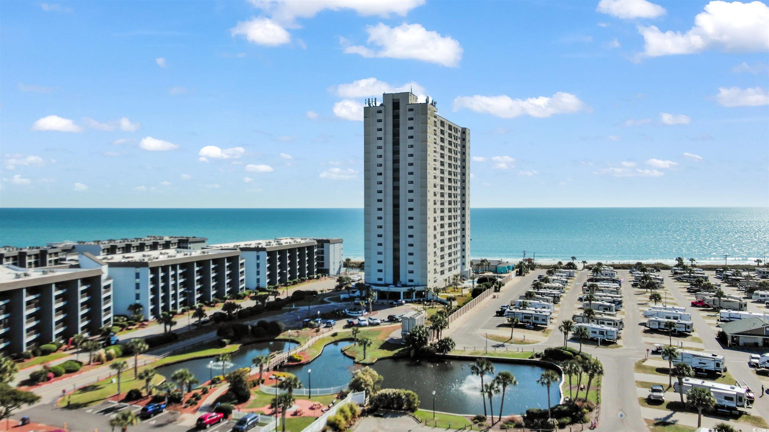 Image 1: Bird's eye view of a large body of water Image 1: Bird's eye view of a large body of water