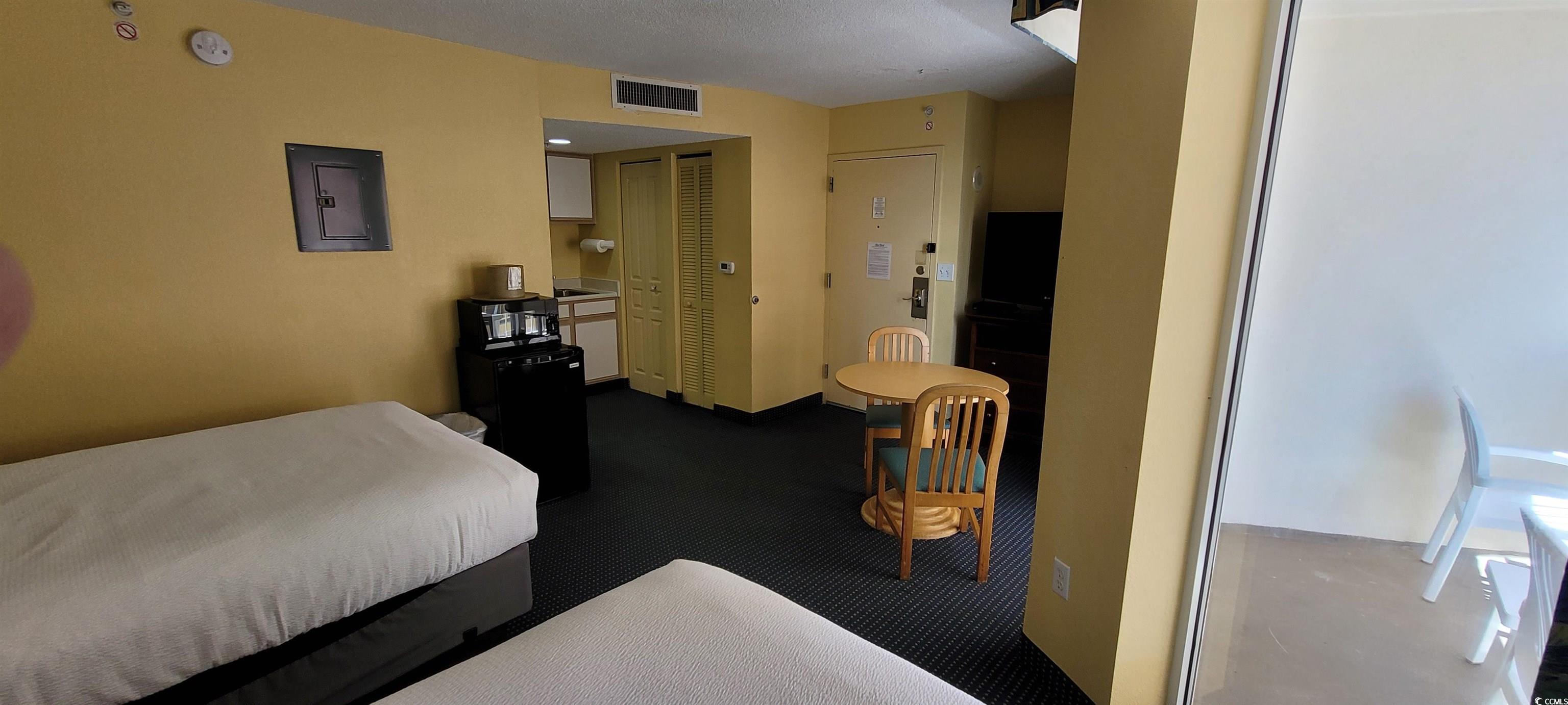 Image 3: Bedroom featuring electric panel Image 3: Bedroom featuring electric panel