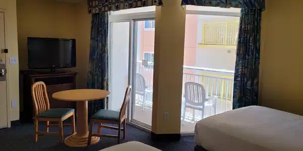 Image 4: Bedroom with dark carpet
