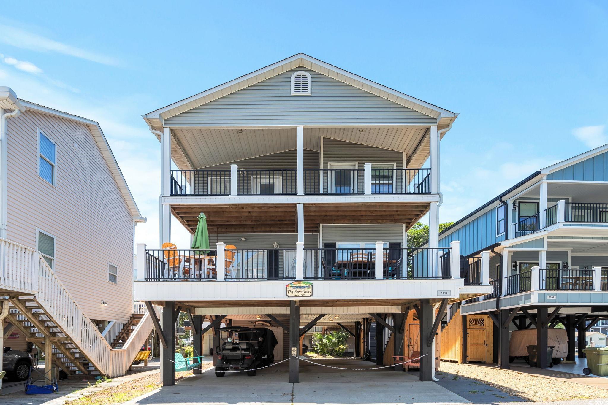 Image 2: Coastal inspired home with a balcony, a carport, c Image 2: Coastal inspired home with a balcony, a carport, c