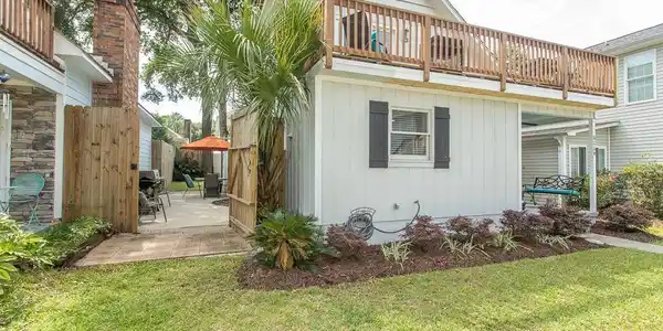 Image 3: Rear view of house featuring a yard, a patio area, Image 3: Rear view of house featuring a yard, a patio area,