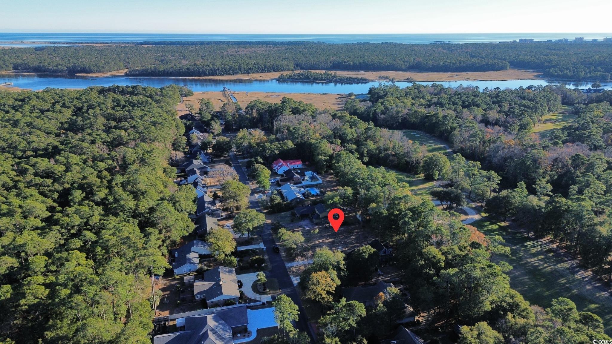 Image 2: Aerial view of property's location featuring a for