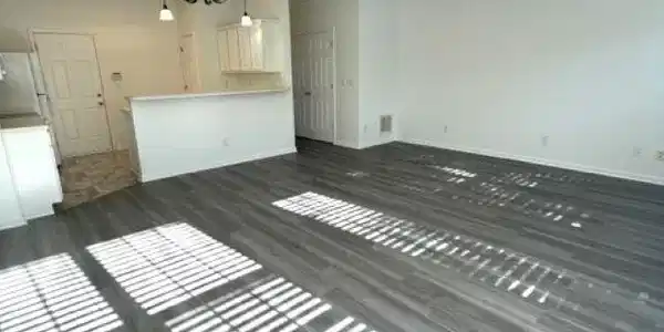 Image 2: Unfurnished living room with a textured ceiling, d Image 2: Unfurnished living room with a textured ceiling, d