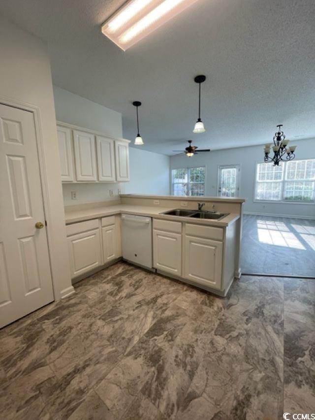 Image 4: Kitchen with decorative light fixtures, white dish