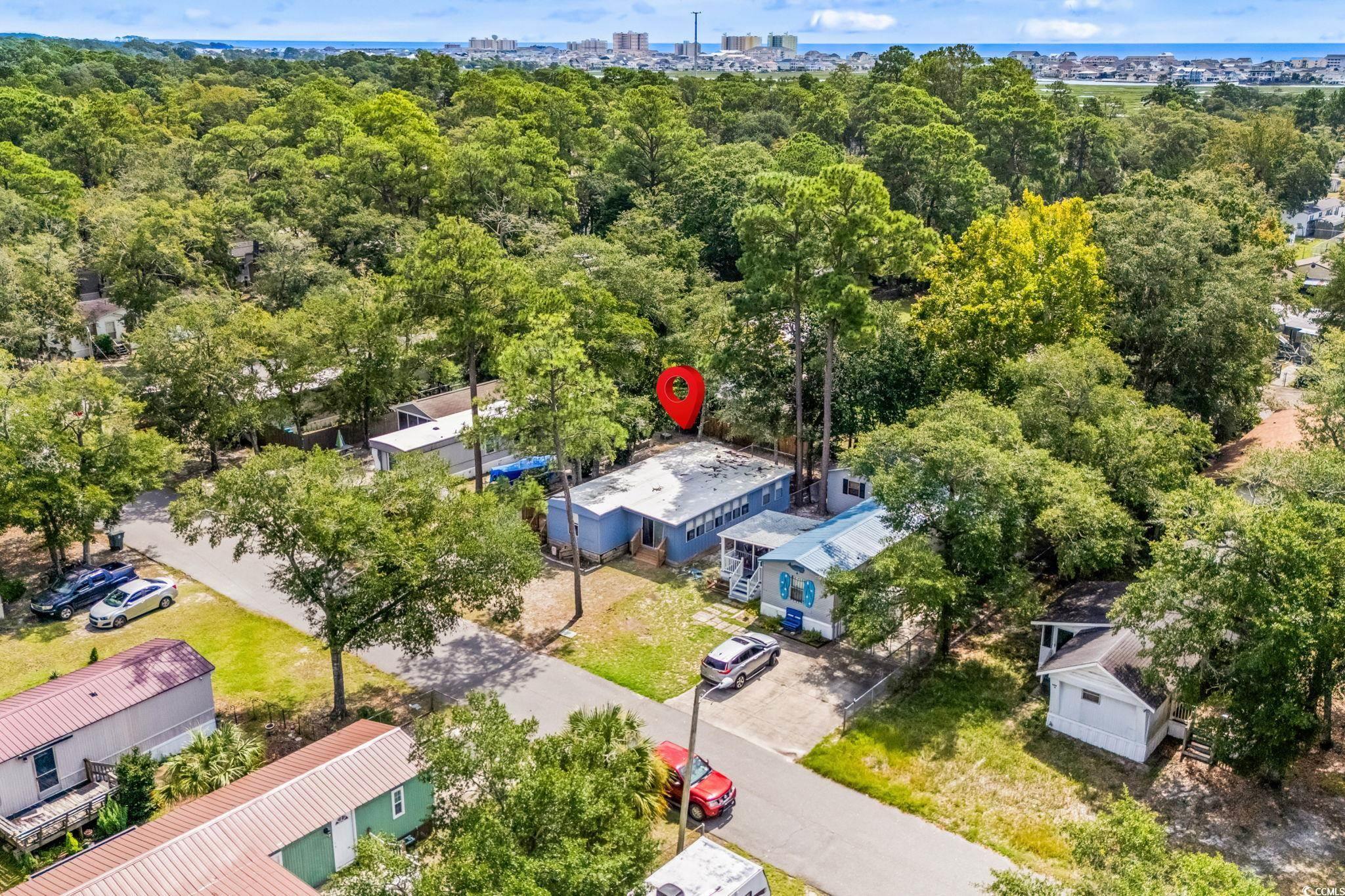Image 3: View of urban area featuring a forest Image 3: View of urban area featuring a forest