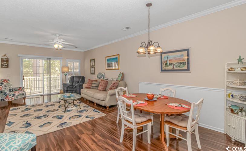 Image 2: Dining room with ornamental molding, hardwood / wo Image 2: Dining room with ornamental molding, hardwood / wo