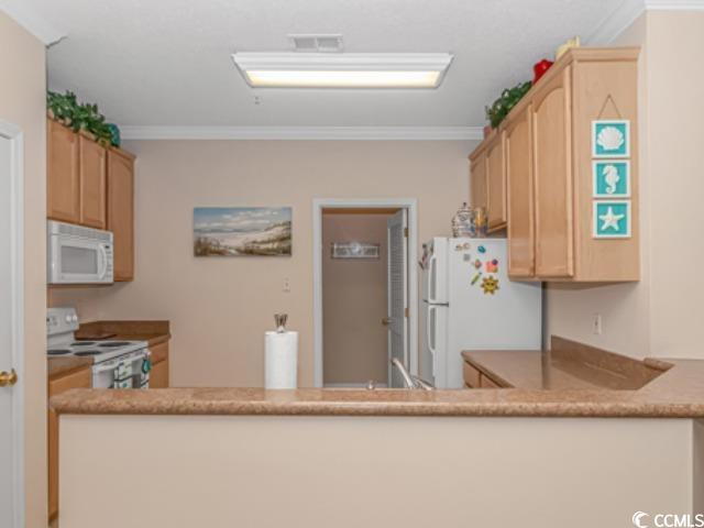 Image 3: Kitchen with crown molding, light brown cabinets, Image 3: Kitchen with crown molding, light brown cabinets,