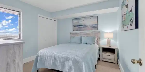Image 3: Bedroom featuring light carpet and a closet Image 3: Bedroom featuring light carpet and a closet