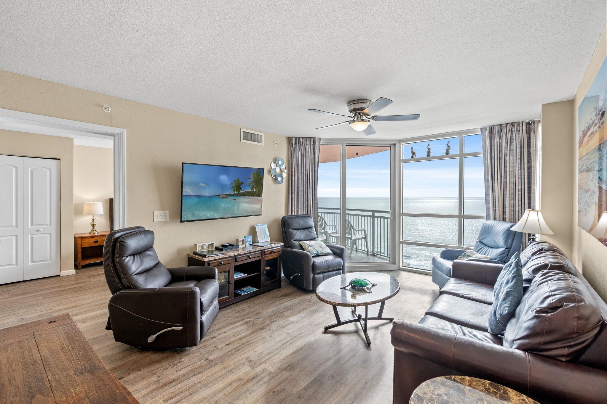Image 4: Living area featuring floor to ceiling windows, li Image 4: Living area featuring floor to ceiling windows, li