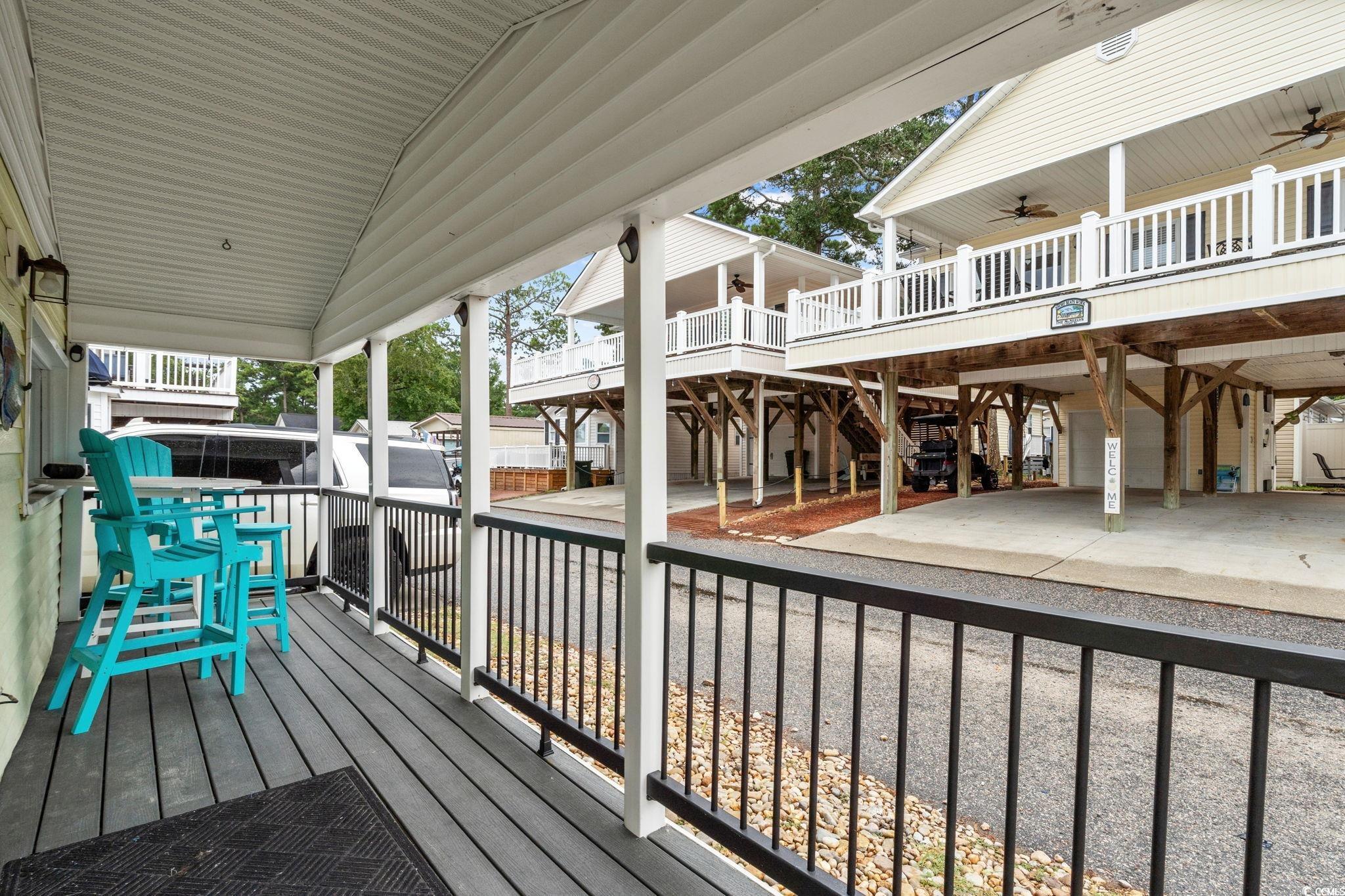 Image 3: Deck featuring a ceiling fan