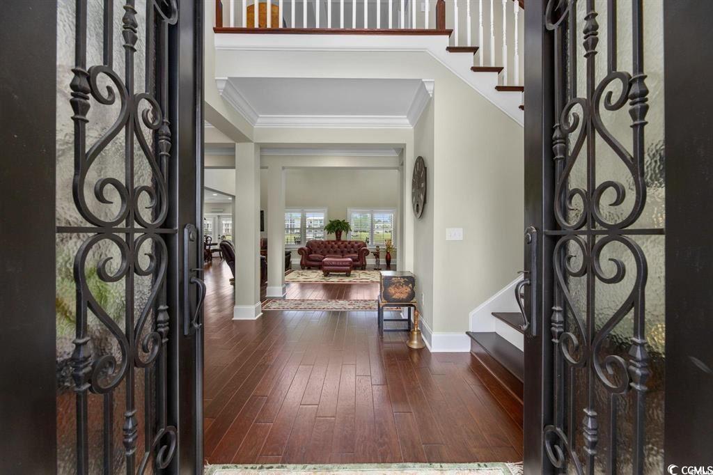 Image 3: Entrance foyer featuring dark wood finished floors
