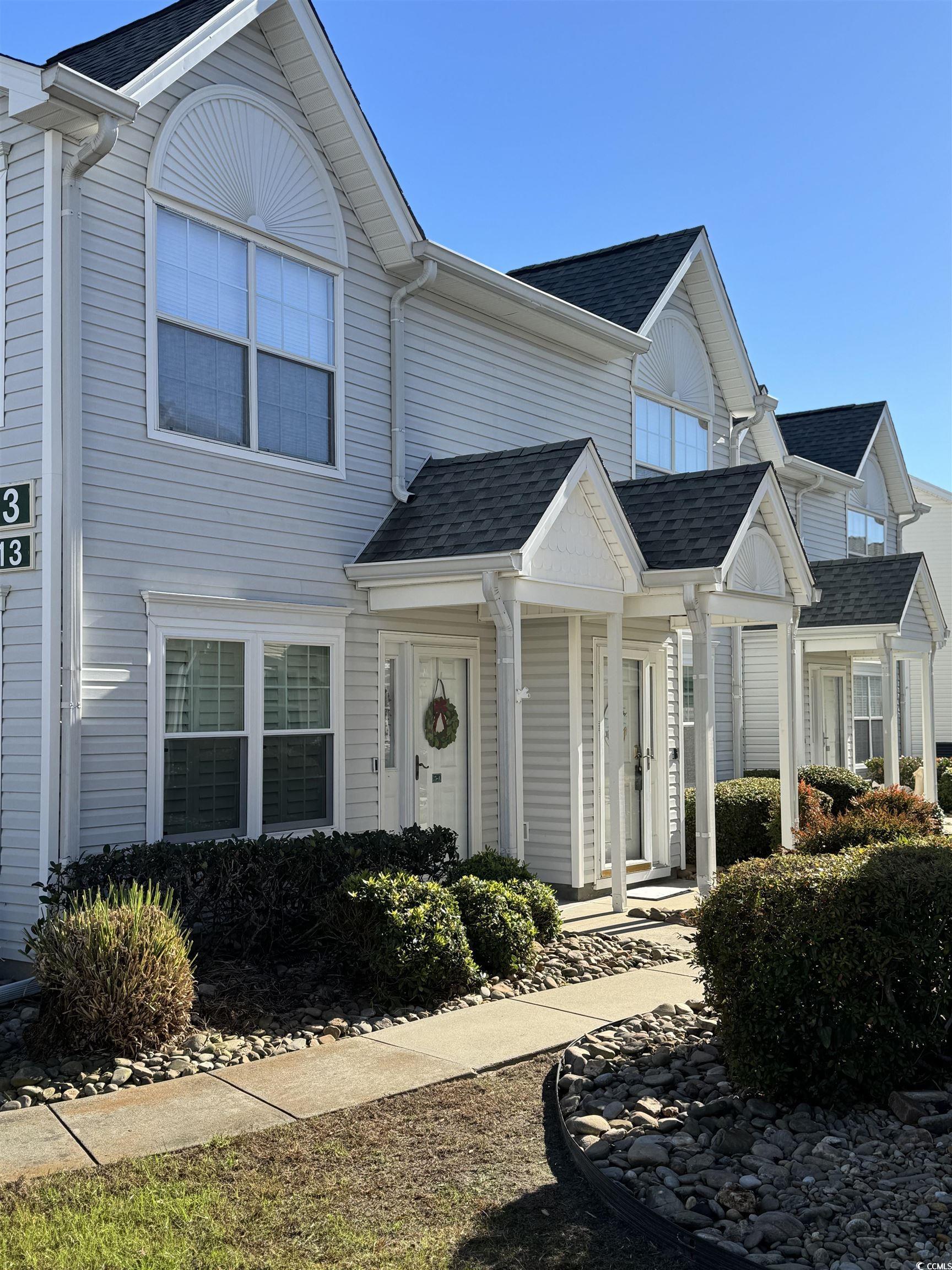 Image 2: View of front of home with a shingled roof Image 2: View of front of home with a shingled roof