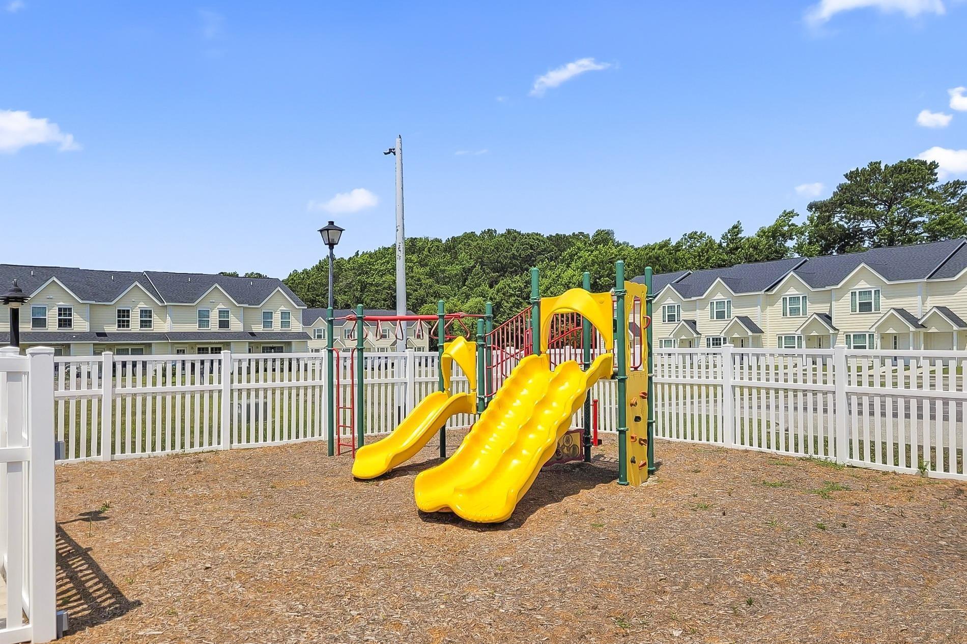 Image 4: Community play area with a residential view