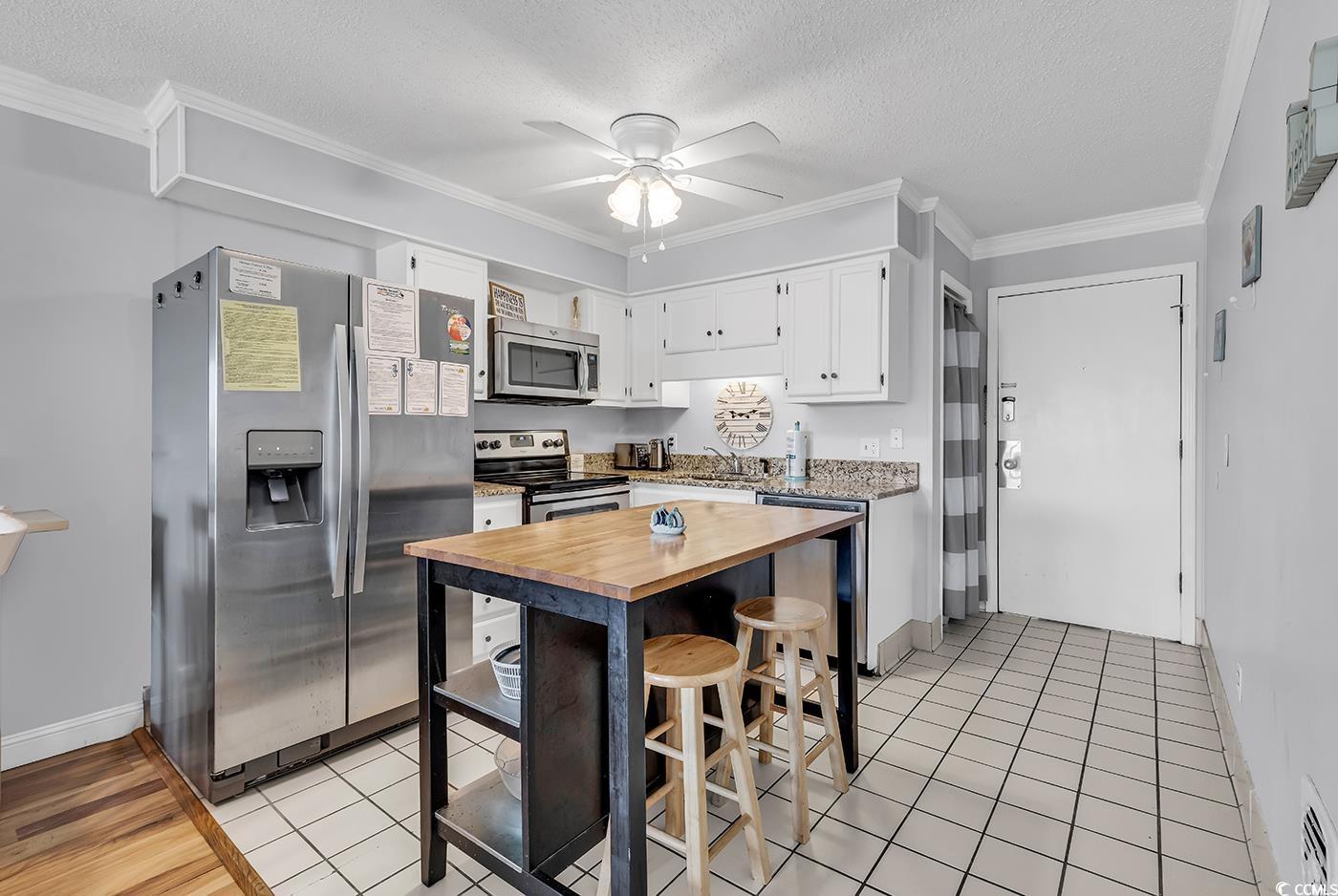 Image 4: Kitchen featuring stainless steel appliances, butc Image 4: Kitchen featuring stainless steel appliances, butc