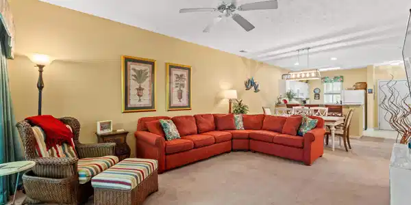 Image 3: Living area featuring light carpet, a textured cei Image 3: Living area featuring light carpet, a textured cei