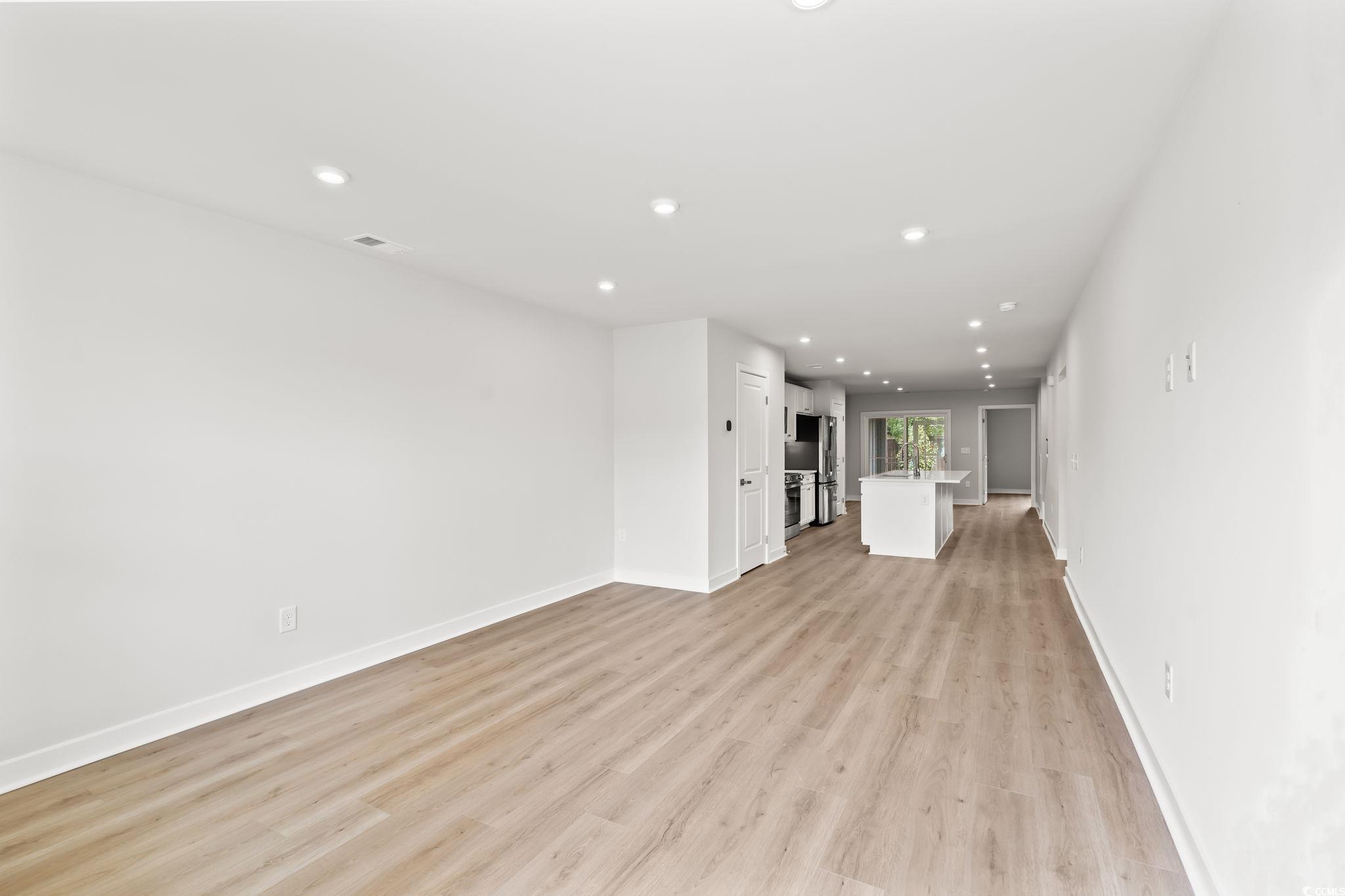 Image 3: Unfurnished living room featuring recessed lightin Image 3: Unfurnished living room featuring recessed lightin